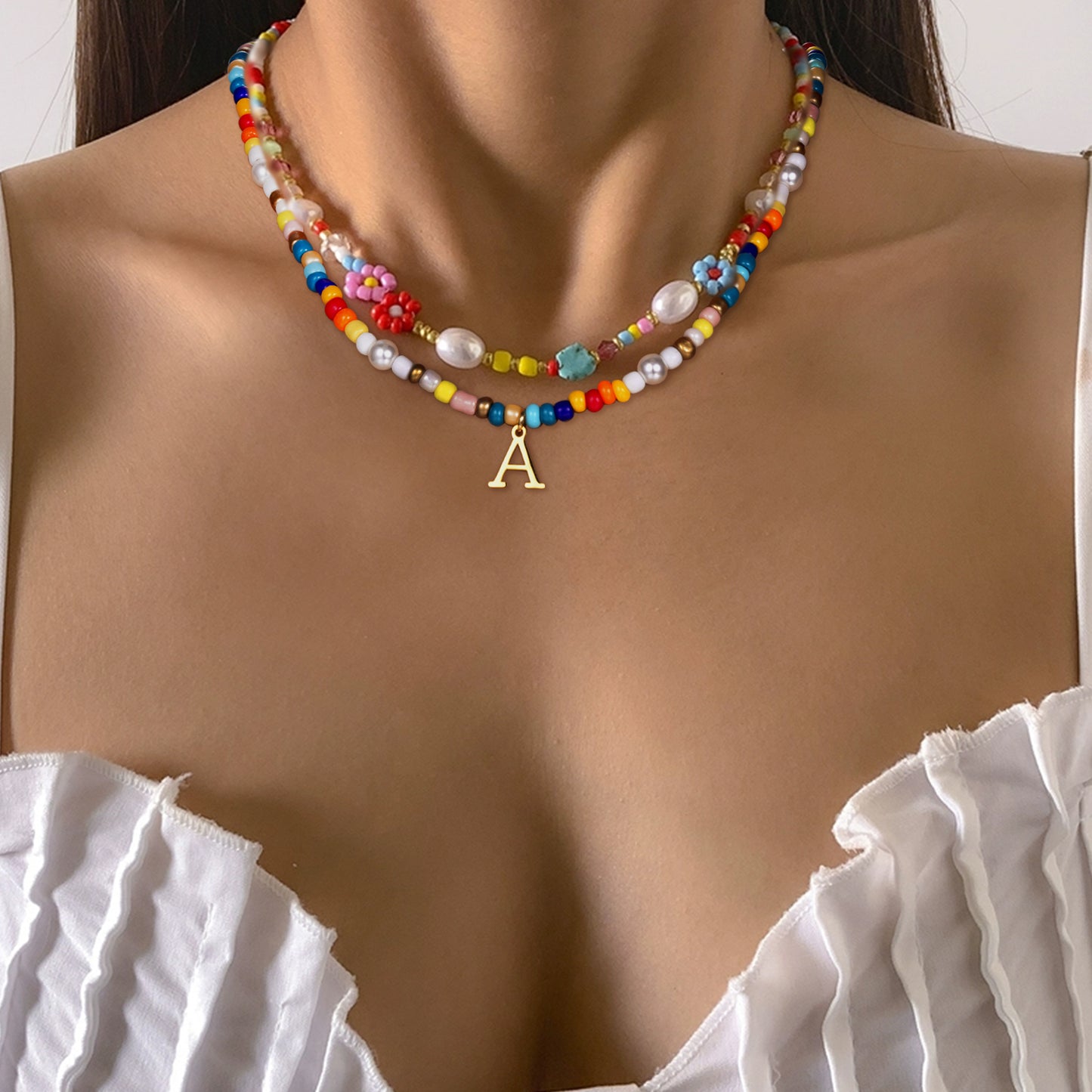 JSJOY Colorful Beaded Initial Necklaces for Women Girls Summer Beaded Choker Beach Necklace Rainbow Beaded Necklace Gold Tiny Letter A-Z Pendant Handmade Coloful Necklace Jewelry Gifts